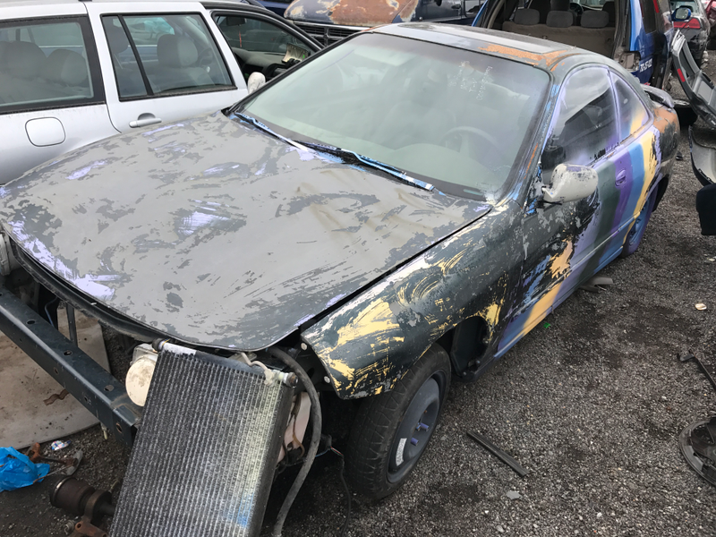 What I assume was a Toyota Celica with a bad paint job.